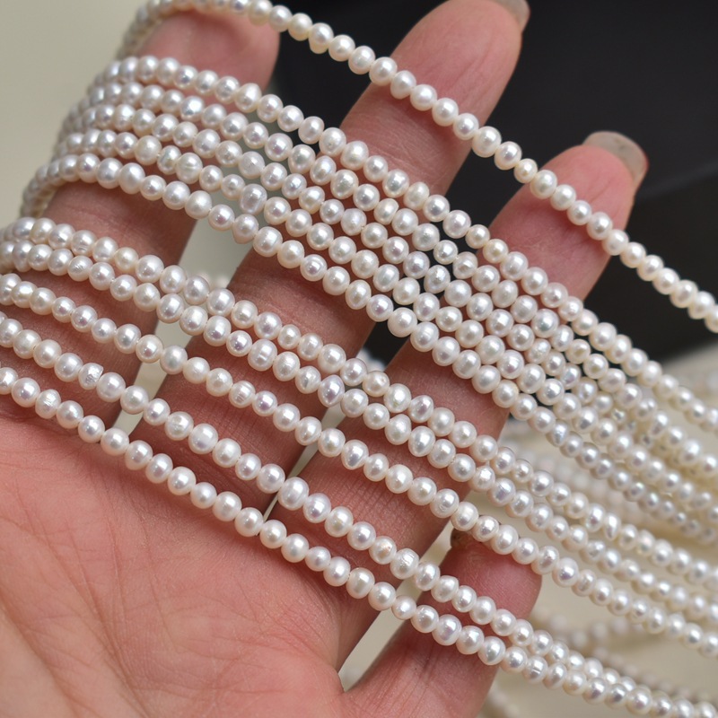 Pearl Necklace - Natural freshwater pearls, white, 3-7mm egg-shaped